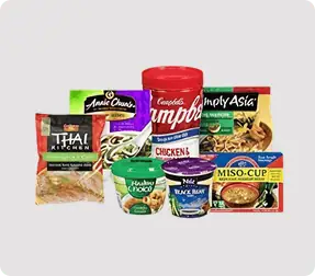 Assorted instant noodle packages on display.